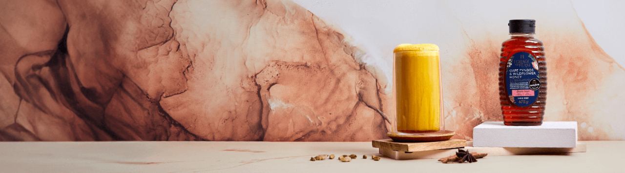 A delicious Golden Latte recipe by Checkers Namibia, made with ButtaNutt, honey, turmeric, cinnamon and ginger.